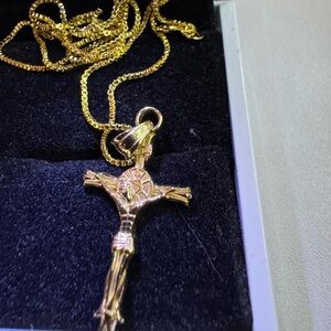 New 14K Gold INRI Crucifix Cross Pendant and Solid is 1 millimeter wide.